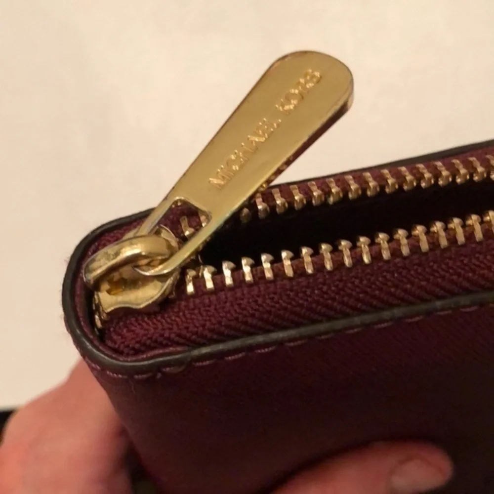 Michael kors burgundy continental zipper wallet